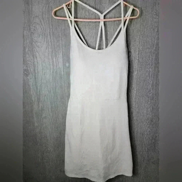 Old Navy Dresses & Skirts - Old Navy Active tennis dress with built-in shorts. Size LG tall. Cream